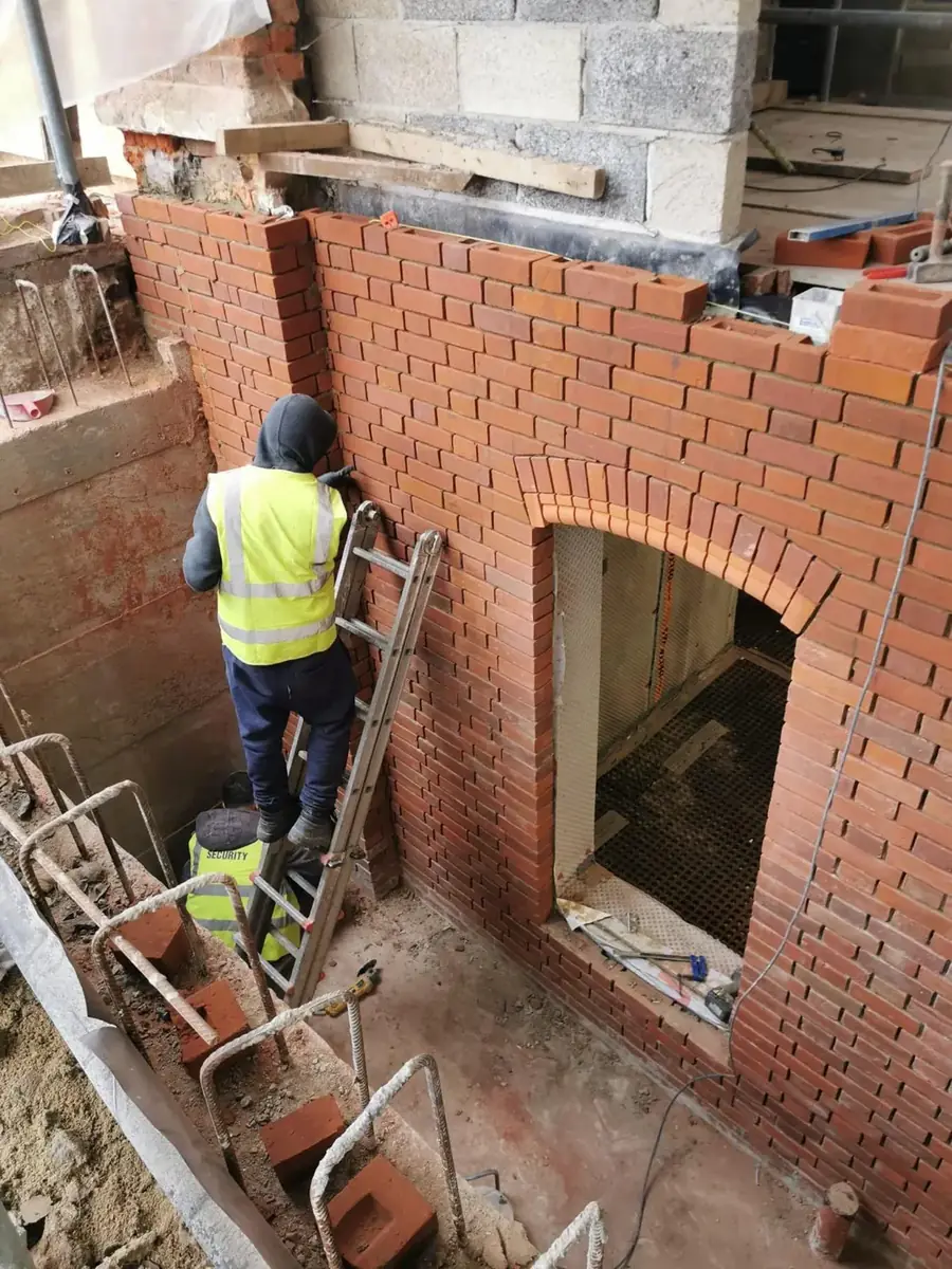 Brickwork to an arched opening