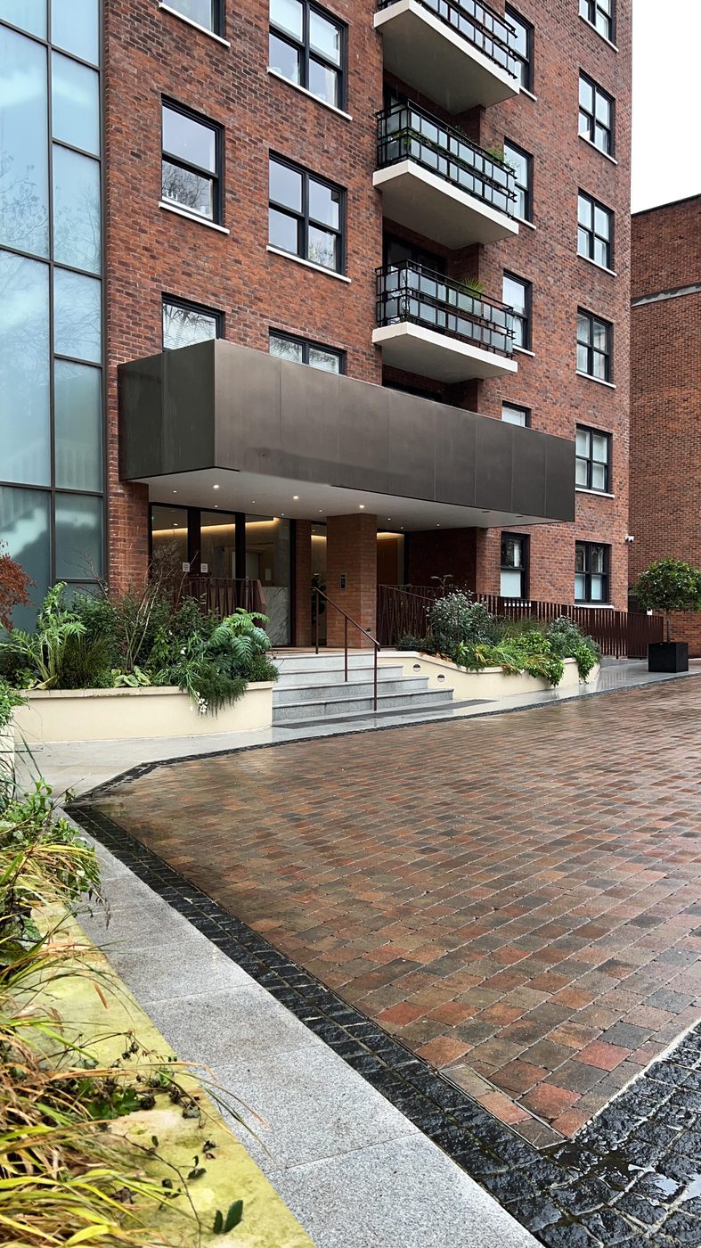 Entrance, canopy and landscaping